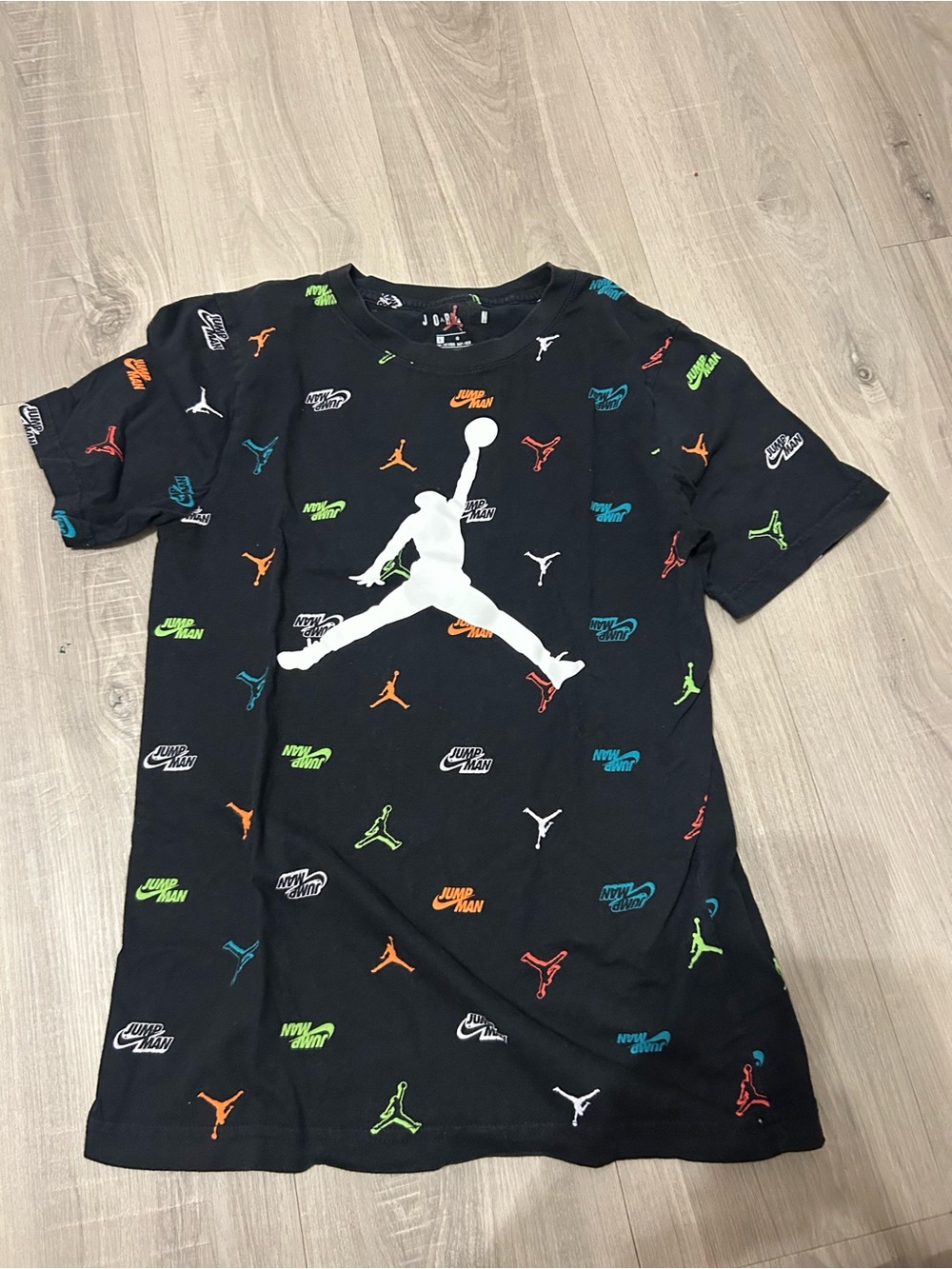 Jordan Black Tee with Red Jumpman and Multicolor Accents